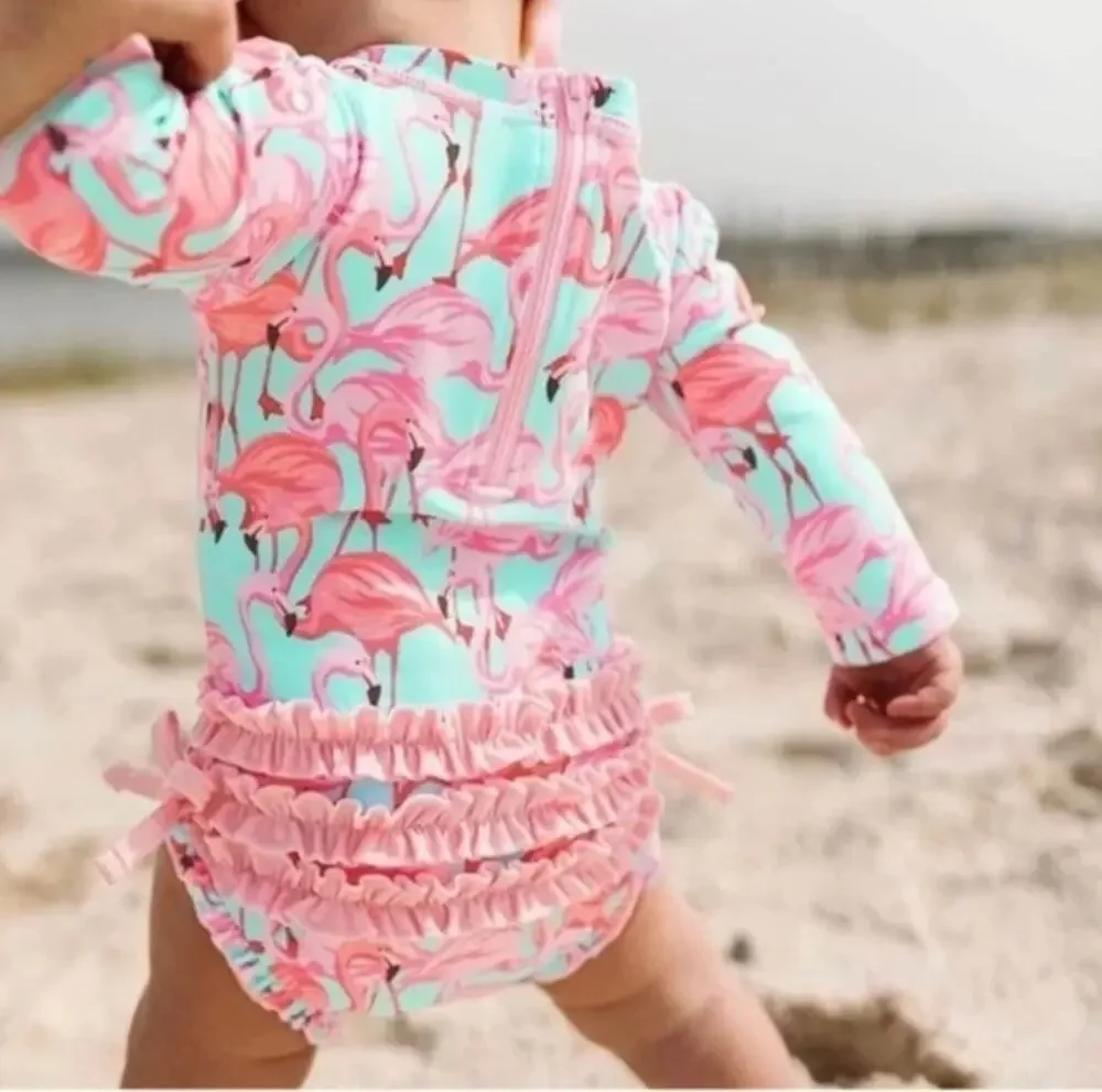 RuffleButts Vibrant Flamingo Long Sleeve One Piece Rash Guard Swimsuit 18-24 MO